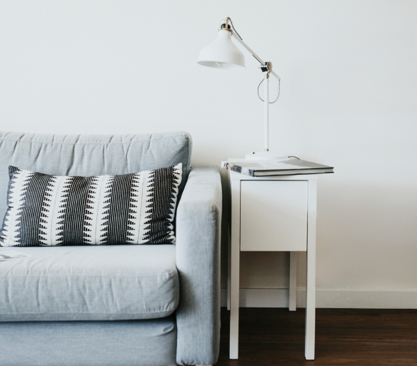 sofa, bedside table and table lamp